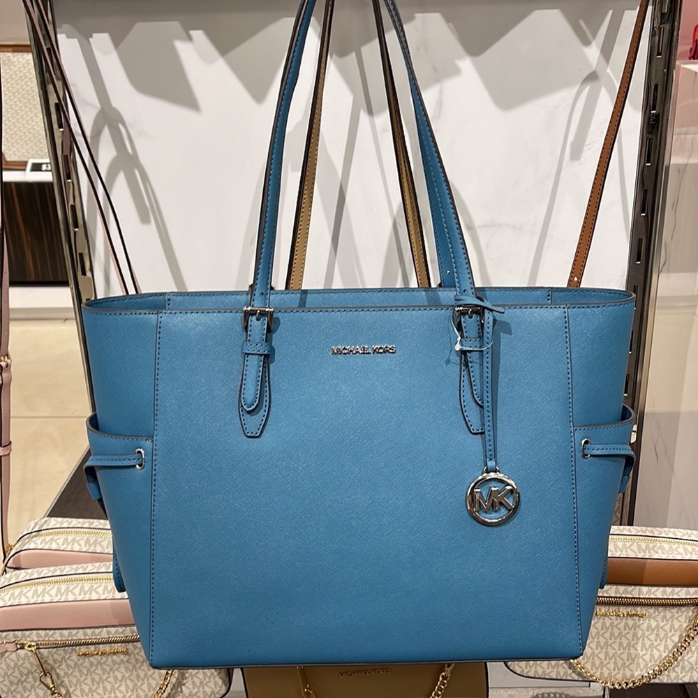 Michael Kors Gilly Large Drawstring Travel Leather Top Zip Tote
 Color: TEAL
NWT